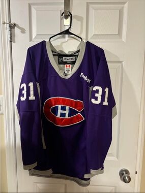 Vintage Reebok Purple Hockey Jersey with Number 31
